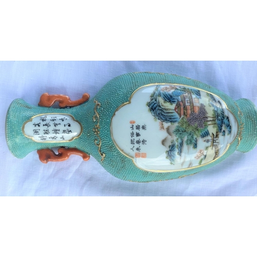 346B - A Chinese wall pocket in the form of a turquoise vase with central painted country scene, Chinese ch... 