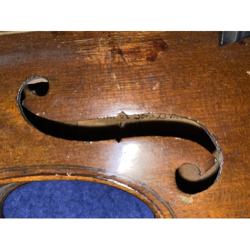 170a - Violin.  A 19th century 3/4 violin with two piece back, bearing a label to the interior: Antonius St... 