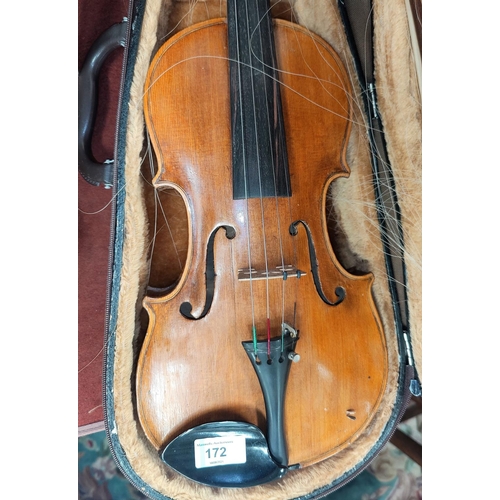 172 - A late 19th/early 20th century two piece birch back violin, marked HOPF with bow and hard case (spli... 