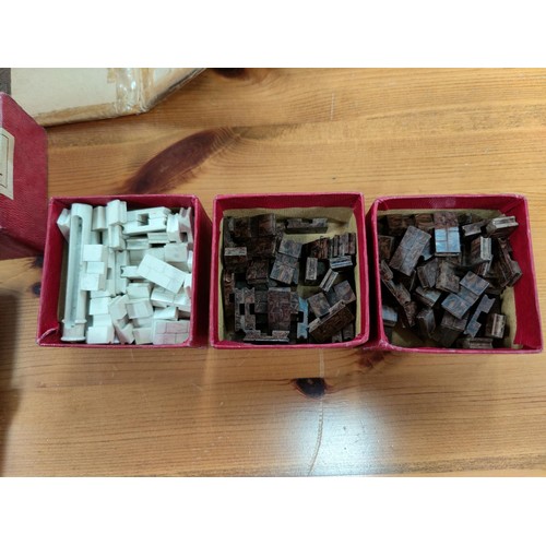302 - A quantity of housebuilding kit by Bayko