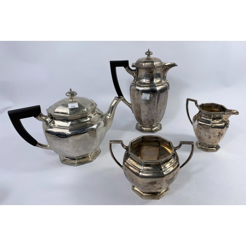 618 - A hallmarked silver 4 piece tea set of octagonal tapering form, Sheffield 1934, 68.24oz.