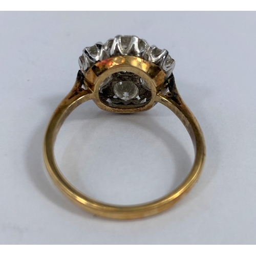 619 - A yellow metal ring set large diamond flower head cluster, diameter of centre stones 4.8 mm approx, ... 