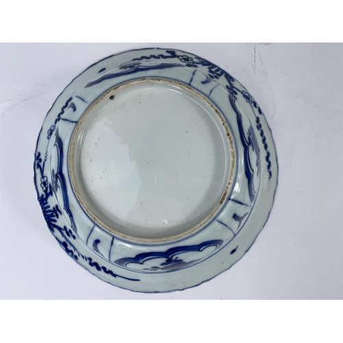 389B - A 19th century Chinese blue and white bowl with deer in country scene to the interior and further de... 