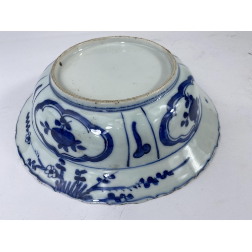 389B - A 19th century Chinese blue and white bowl with deer in country scene to the interior and further de... 
