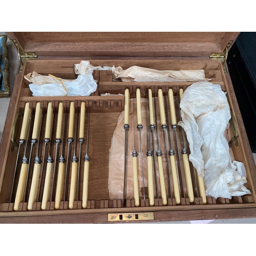 617 - A part set of Old English pattern cutlery, monogrammed, in fitted canteen box