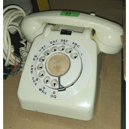 23 - A 1970's ivory coloured telephone