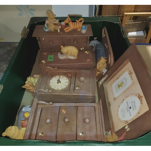 25 - A collection of Border Fine Arts groups, 'Classic Pooh':  clock; miniature chests; etc.