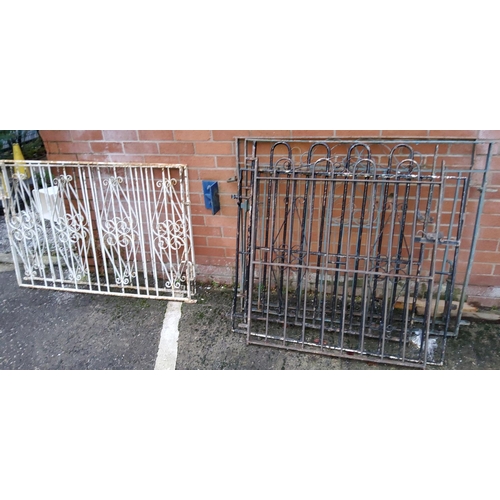 33 - A pair of cast metal gates, another pair of cast metal gates, similar metal fencing