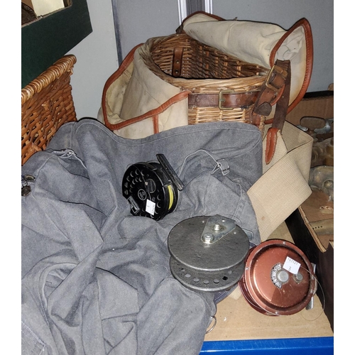 3 - A wicker and canvas fisherman's creel, 3 fly reels, a waistcoat etc