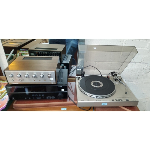 304 - A Trio KD-4100 R record deck; a Trio 4 channel Decoder - Amplifier KSG - 400; a Yamaha receiver RX-V... 
