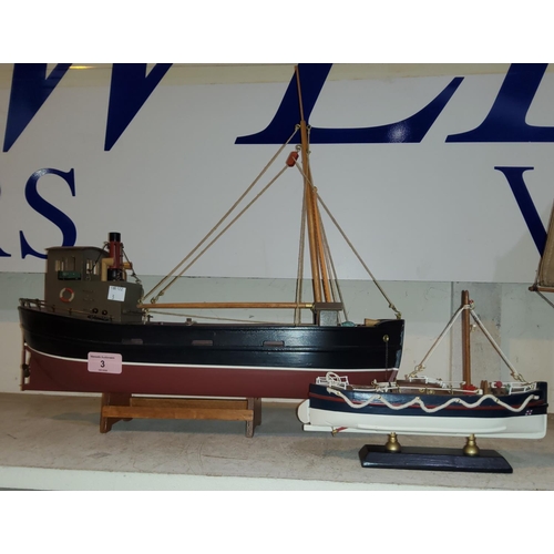 3 - A model of a fishing boat with hold, lifeboat 45cm etc another model of a vintage lifeboat, 23cm