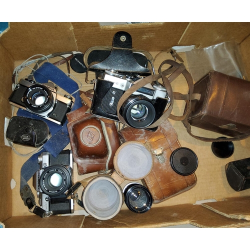 32 - Two Olympus SLR cameras; various others