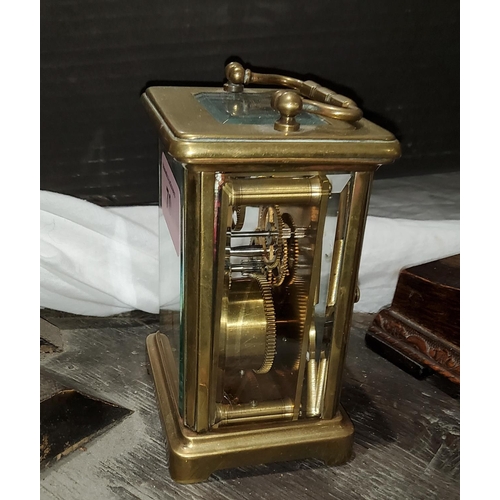 70 - A 19th century French carriage clock in brass case, with timepiece movement and cylinder escapement,... 