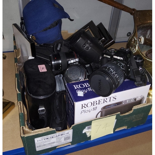 74 - A Minolta SLR camera; other cameras; lenses; etc.