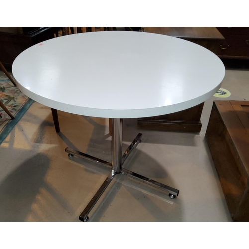889 - A 1960's kitchen table with white laminate circular top on chrome column and 2 chairs in chrome and ... 