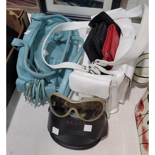 20 - A white handbag by 'Tommy & Kate'; a turquoise handbag; a pair of Gucci sunglasses, cased; etc.