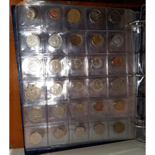 43 - A collection of coins from islands around the world in album:  Ceylon; Samoa; New Guinea and ot... 