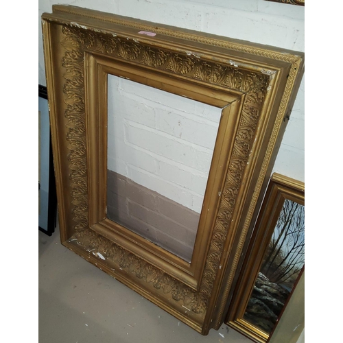 58 - A 19th century giltwood mirror frame, 74 x 60 cm overall