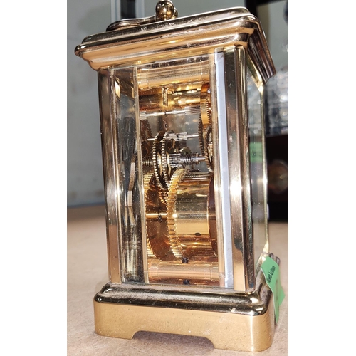 27 - A modern brass carriage clock by Bernard Frères