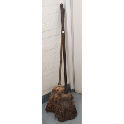 40 - Two vintage wooden brooms