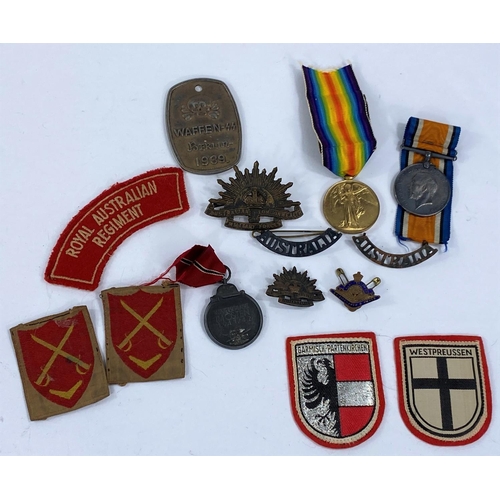 127 - A WWI pair of 3616 Gnr T.H.Ward 2 FABAIF; an Australian cap badge