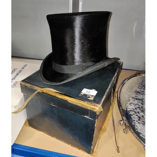 24 - A boxed top hat in black silk, Victoria Coupe, Bolton, 19 cm x 15.5 cm