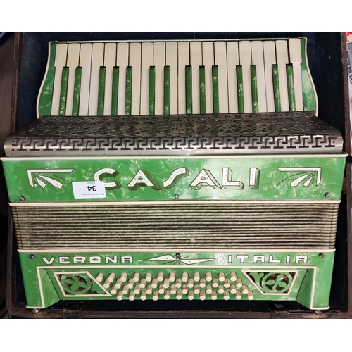 34 - A 48 base piano accordion by Casali, Verona, in leather case (case a.f.)