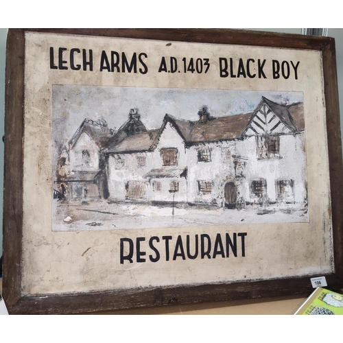 106 - An antique pub/restaurant sign for The Legh Arms Black Boy A.D 1403 in Prestbury painted in pine fra... 