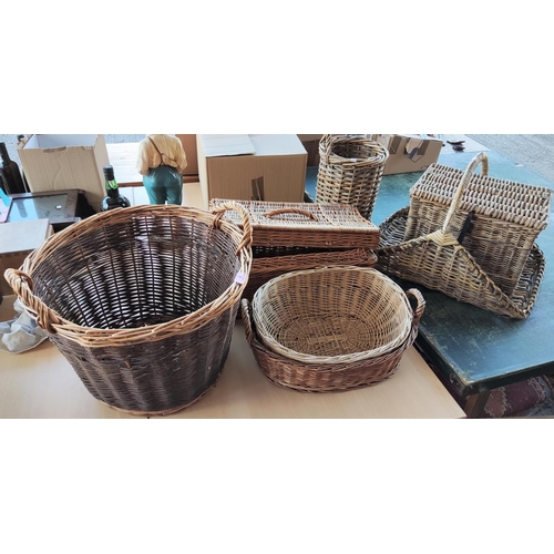 4 - A large woven basket; 3 others; 2 picnic baskets