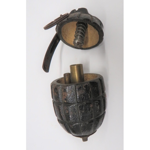 WW1 Period No 23 MKII Demonstration Mills Grenade
steel fragmentation body cut so the top can be removed.  Lower base plug marked "No 23 MKII WER" dated "17".  Pressed steel lever and steel split ring.  