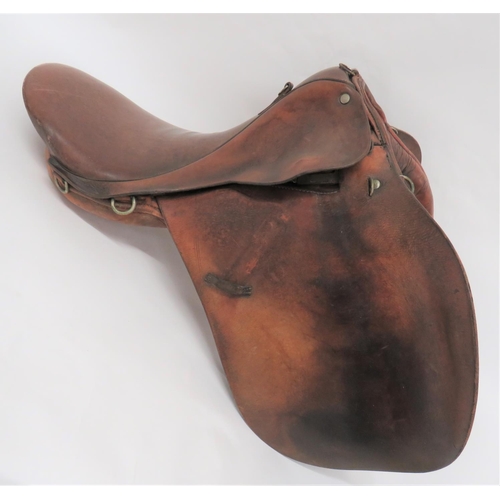 Officer Pattern Military Saddle
brown leather seat with high back.  Leather side panels.  Internal padding.  White metal fittings.  Some wear.  