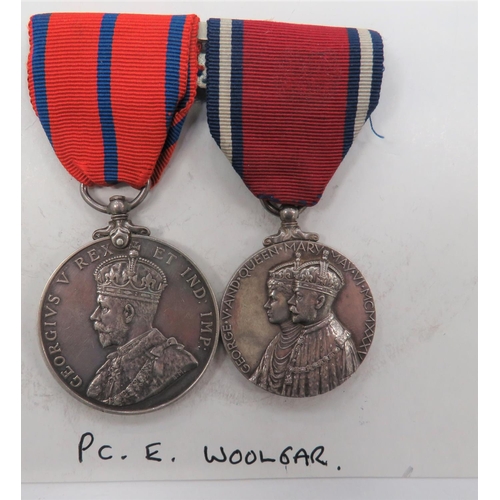 Metropolitan Police Coronation 1911 Medal Pair
consisting KGV 1911 Coronation for the Metropolitan Police named "PC E Woolgar".  Together with a 1911 Coronation medal, unnamed as issued.  Mounted as worn.  Complete with a copy Record Of Service.  