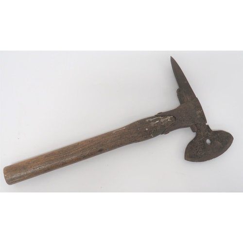 Early 19th Century Napoleonic Wars Pattern Boarding Axe
single edged, curved blade with central hole.  Rear square section spike.  Fitted through a steel horseshoe mount with steel tightening spike.  Polished wooden shaft with widening section towards the head.  Steel pitted with dark patina.  