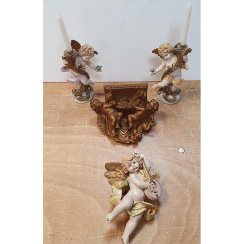 21 - Collection of cherub related ornaments to include candlesticks etc (4)