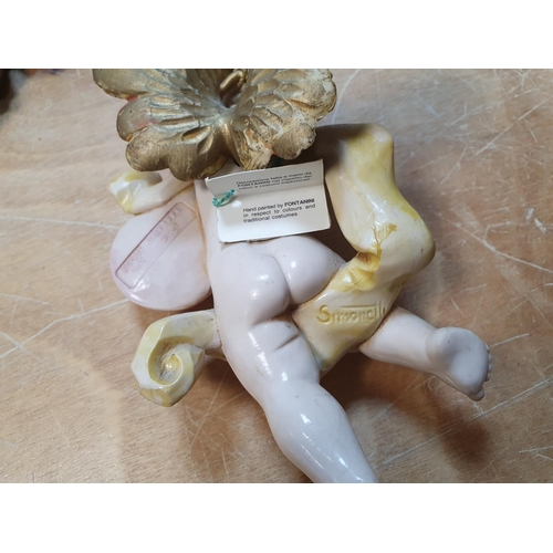 21 - Collection of cherub related ornaments to include candlesticks etc (4)