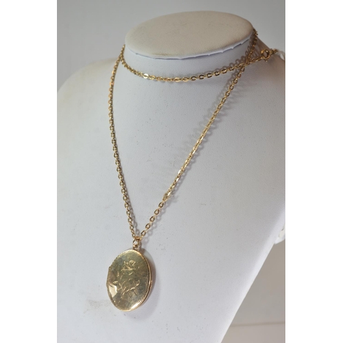 Large 9ct gold locket with floral 