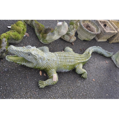 Impressive garden crocodile, carved from a single piece of granite. L165cm