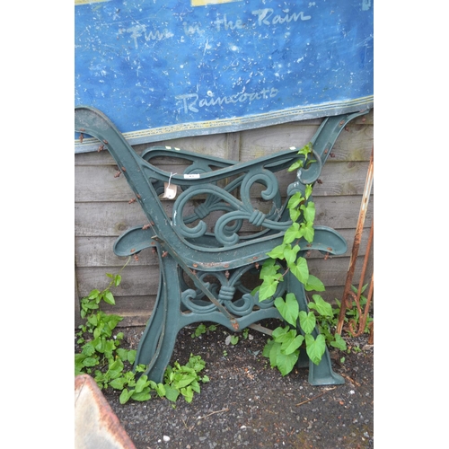 26 - Pair of green metal bench ends