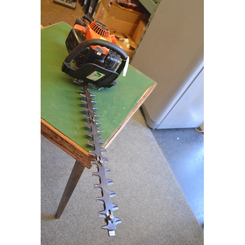 Tanaka THT2100 petrol hedge trimmer. Vendor says engine is running but