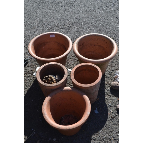 4 - 2 pairs of terracotta planters and one other. Height of tallest pair is 27cm x 30cm diameter