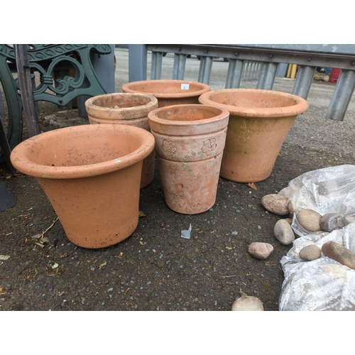 4 - 2 pairs of terracotta planters and one other. Height of tallest pair is 27cm x 30cm diameter
