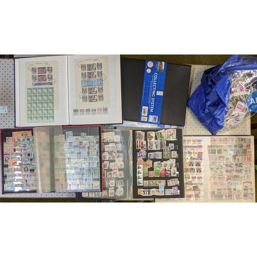 51 - Mixed Lots; shopping bag with four stockbooks of world stamps, mainly used, sometimes duplicated, in... 