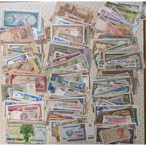 46 - Banknotes; a very mixed bundle of foreign (i.e. non-UK) notes from a wide variety of countries. Mixe... 