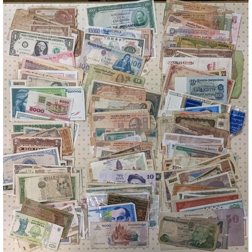 47 - Banknotes; a very mixed bundle of foreign (i.e. non-UK) notes from a wide variety of countries. Mixe... 