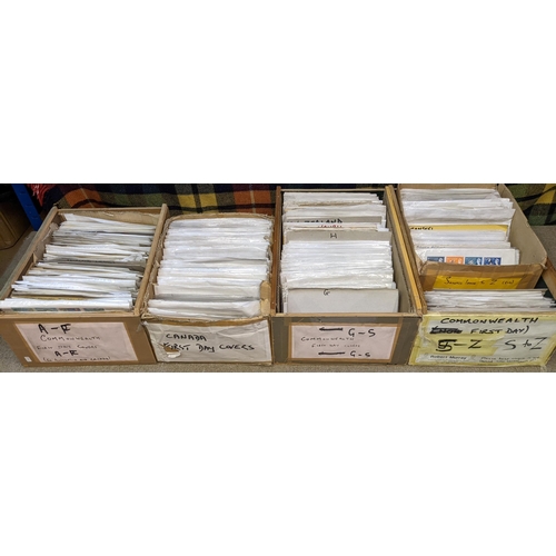 31 - Covers; four boxes of priced stock of Commonwealth first day covers, each priced using soft pencil a... 