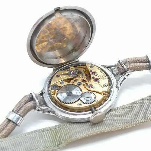 58 - Platinum cased diamond set (40 in total) Vertex supreme manual wind wristwatch on original silk stra... 
