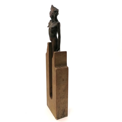 26 - A contemporary bronze of a woman on a plaster base, limited edition 112/990. 41cm high