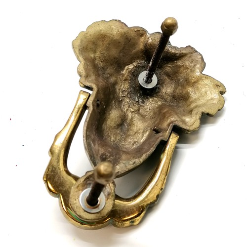 43 - Brass door knocker with a classical mans face 18cm long x 13cm wide