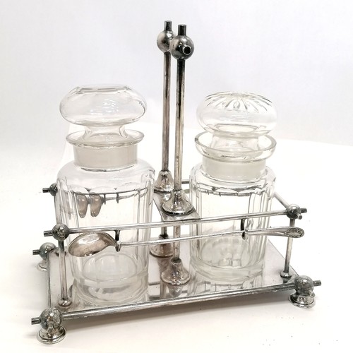 131 - Silver plated Archibald Knox influenced 2 jar pickle stand by Daniel & Arter with 2 Selfridge & Co s... 