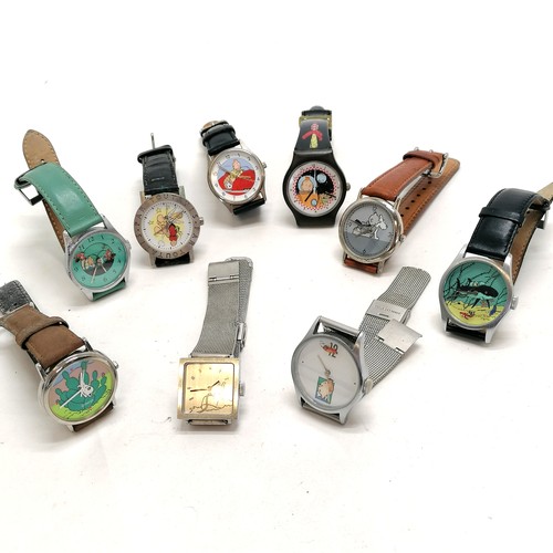 373 - 8 x Tintin novelty watches t/w Asterix watch - all for spares / repairs